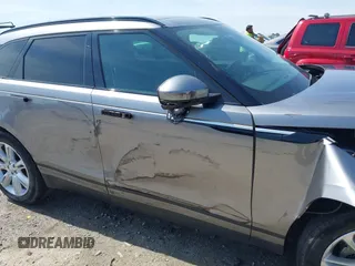 2020 Land Rover Range Rover Velar S z VIN SALYB2EX7LA259607, wystawiony jako IAAI lot #40980294 z przebiegiem 95 967 mil mil oraz . Historia ofert i sprzedaży dostępna na DreamBid. Obrazek 17.