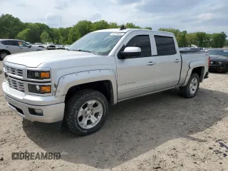 2015 Chevrolet Silverado 1500 LT with VIN 3GCUKREC9FG147988, listed as a Copart auction lot 53784635 with 218,260 mi miles and Salvage Title. Bid and sale history available at DreamBid. Image 1.