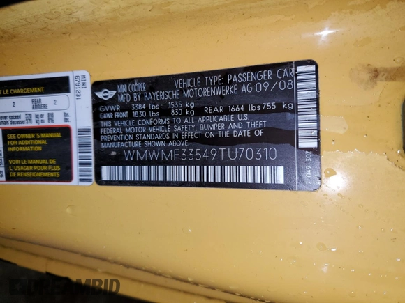 2009 MINI Hardtop z VIN WMWMF33549TU70310, wystawiony jako Copart lot #57797815 z przebiegiem 136 843 mil mil oraz Szkody całkowita. Historia ofert i sprzedaży dostępna na DreamBid. Obrazek 12.