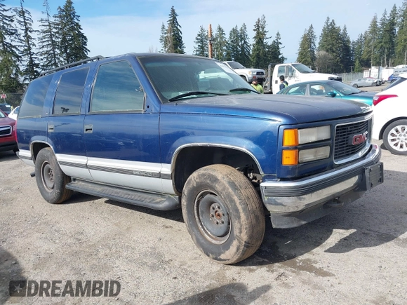 1997 GMC Yukon with VIN 1GKEK13R8VJ737324, listed as a IAAI auction lot 41675479 with 237,223 mi miles. Bid and sale history available at carsss.com. Image 1.