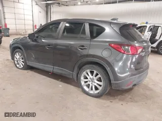 2015 Mazda CX-5 Grand Touring with VIN JM3KE4DYXF0467606, listed as a IAAI auction lot 41345790 with 107,915 mi miles. Bid and sale history available at carsss.com. Image 3.