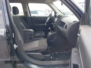 2014 Jeep Patriot Latitude with VIN 1C4NJRFB9ED778409, listed as a IAAI auction lot 41952027 with 88,306 mi miles and . Bid and sale history available at DreamBid. Image 5.