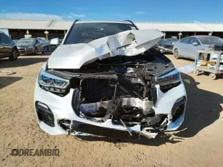 2020 BMW X5 M50i with VIN 5UXJU4C00L9B77869, listed as a Copart auction lot 36123043 with 27,195 mi miles. Bid and sale history available at carsss.com. Image 5.