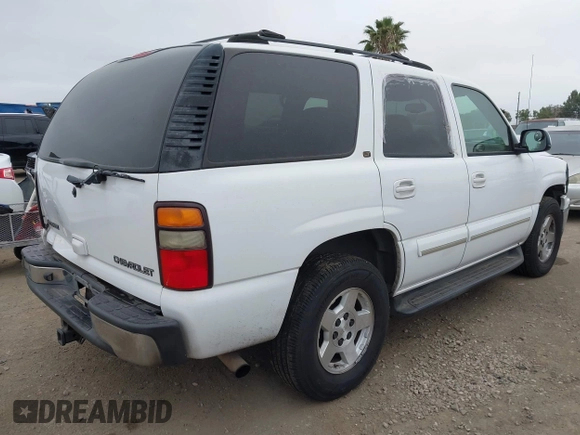 2004 Chevrolet Tahoe LS with VIN 1GNEC13T14R166447, listed as a IAAI auction lot 42432428 with 170,984 mi miles and . Bid and sale history available at DreamBid. Image 4.