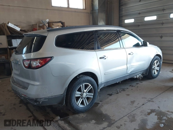 2015 Chevrolet Traverse LT with VIN 1GNKVHKD3FJ126405, listed as a IAAI auction lot 41597600 with 188,558 mi miles and . Bid and sale history available at DreamBid. Image 4.
