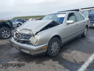 1997 Mercedes-Benz E-Class with VIN WDBJF55F3VA391335, listed as a IAAI auction lot 41606546 with 1 mi miles. Bid and sale history available at carsss.com. Image 18.