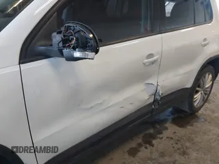 2013 Volkswagen Tiguan with VIN WVGCV3AX7DW605594, listed as a IAAI auction lot 42057457 with 131,629 mi miles and . Bid and sale history available at DreamBid. Image 6.