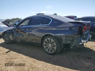 2018 BMW 5 Series 530e with VIN WBAJA9C52JB249402, listed as a Copart auction lot 55093055 with 117,033 mi miles and Salvage title. Bid and sale history available at DreamBid. Image 2.