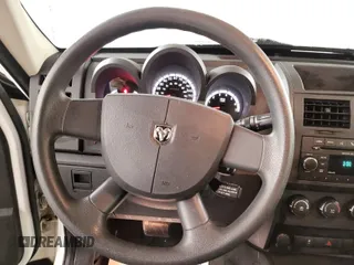 2011 Dodge Nitro SE z VIN 1D4PT2GK2BW589063, wystawiony jako IAAI lot #42408917 z przebiegiem 160 504 mil mil oraz . Historia ofert i sprzedaży dostępna na DreamBid. Obrazek 49.