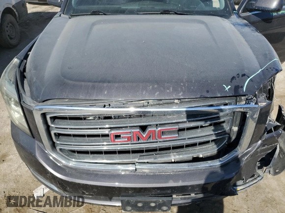 2015 GMC Yukon SLT z VIN 1GKS2BKC9FR147397, wystawiony jako Copart lot #53157845 z przebiegiem 131 552 mil mil oraz Szkoda całkowita • Salvage title. Historia ofert i sprzedaży dostępna na DreamBid. Obrazek 12.