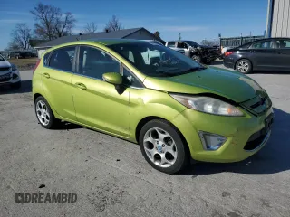 2011 Ford Fiesta SES with VIN 3FADP4FJ6BM132481, listed as a Copart auction lot 48028065 with 148,629 mi miles and Salvage Title. Bid and sale history available at carsss.com. Image 4.
