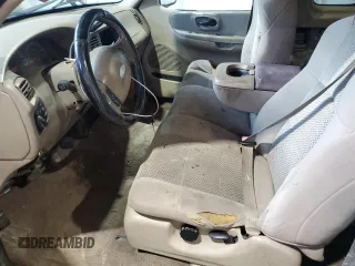 2003 Ford F-150 XL with VIN 1FTRX17283NA46215, listed as a Copart auction lot 85194094 with 168,415 mi miles and Salvage title. Bid and sale history available at DreamBid. Image 7.