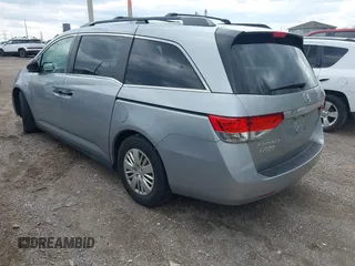 2016 Honda Odyssey LX with VIN 5FNRL5H23GB028338, listed as a IAAI auction lot 41980064 with 186,403 mi miles and . Bid and sale history available at DreamBid. Image 3.
