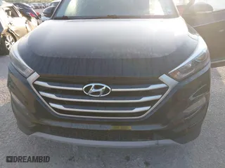 2017 Hyundai Tucson Value with VIN KM8J33A2XHU462806, listed as a IAAI auction lot 42045963 with 102,678 mi miles. Bid and sale history available at carsss.com. Image 6.