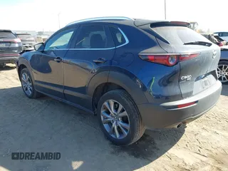2024 Mazda CX-30 S Preferred with VIN 3MVDMBCM2RM720246, listed as a IAAI auction lot 41800330 with 6,743 mi miles and . Bid and sale history available at DreamBid. Image 3.