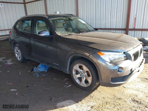 2013 BMW X1 28i with VIN WBAVM1C53DVW43228, listed as a IAAI auction lot 41301776 with 61,323 mi miles. Bid and sale history available at carsss.com. Image 1.