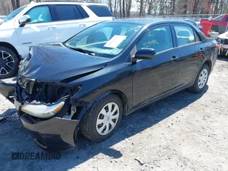 2009 Toyota Corolla with VIN 2T1BU40E19C080007, listed as a IAAI auction lot 42091542 with 124,238 mi miles and . Bid and sale history available at DreamBid. Image 2.
