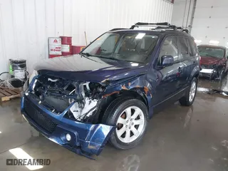 2012 Suzuki Grand Vitara Limited with VIN JS3TD0D76C4100790, listed as a IAAI auction lot 41716479 with 107,102 mi miles. Bid and sale history available at carsss.com. Image 18.