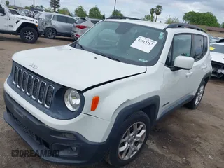 2015 Jeep Renegade Latitude with VIN ZACCJABT0FPB65587, listed as a IAAI auction lot 41913717 with 116,830 mi miles. Bid and sale history available at carsss.com. Image 2.