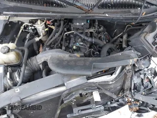 2004 Chevrolet Suburban LS with VIN 1GNEC16Z54J207144, listed as a IAAI auction lot 41244963 with 246,498 mi miles. Bid and sale history available at carsss.com. Image 10.