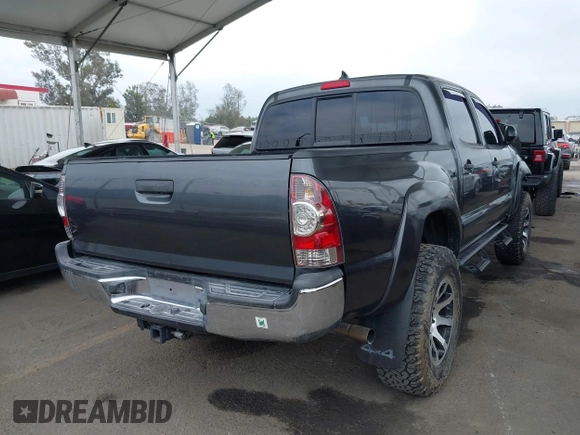2015 Toyota Tacoma with VIN 3TMLU4EN8FM167337, listed as a IAAI auction lot 42117662 with 60,929 mi miles. Bid and sale history available at carsss.com. Image 4.