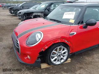2019 MINI Hardtop 4 Door Cooper with VIN WMWXU1C58K2J02294, listed as a IAAI auction lot 41910654 with 97,887 mi miles. Bid and sale history available at carsss.com. Image 6.