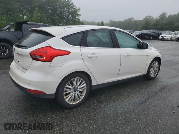 2016 Ford Focus Titanium with VIN 1FADP3N2XGL321275, listed as a Copart auction lot 61282845 with 111,519 mi miles and Salvage title. Bid and sale history available at DreamBid. Image 3.