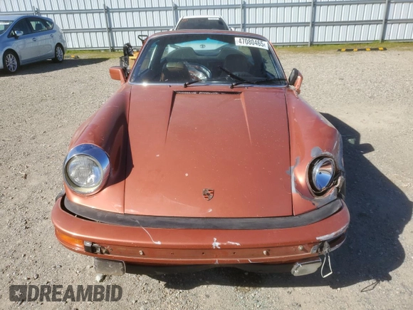 1974 Porsche 911 with VIN 9114111882, listed as a Copart auction lot 47080465 with 4,828 mi miles and Salvage title. Bid and sale history available at DreamBid. Image 5.