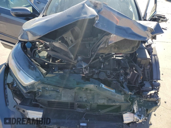 2020 Honda CR-V Touring z VIN 7FARW1H95LE002254, wystawiony jako Copart lot #42535505 z przebiegiem 77 004 mil mil oraz Szkoda całkowita • Salvage title. Historia ofert i sprzedaży dostępna na DreamBid. Obrazek 12.