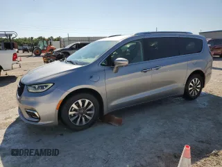 2021 Chrysler Pacifica Hybrid Touring L with VIN 2C4RC1L71MR594686, listed as a Copart auction lot 50885575 with 64,792 mi miles and Clean title. Bid and sale history available at DreamBid. Image 1.