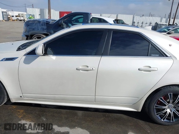 2010 Cadillac CTS with VIN 1G6DK5EVXA0102844, listed as a IAAI auction lot 41818267 with 127,517 mi miles and . Bid and sale history available at DreamBid. Image 14.