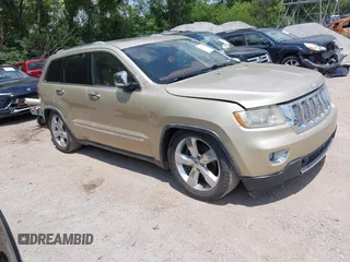 2011 Jeep Grand Cherokee Overland Summit with VIN 1J4RR6GTXBC626392, listed as a IAAI auction lot 42670571 with 142,369 mi miles and . Bid and sale history available at DreamBid. Image 1.