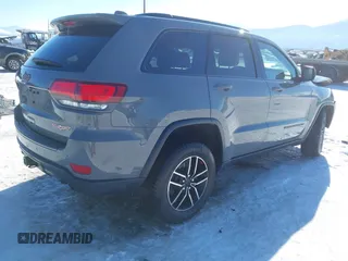2021 Jeep Grand Cherokee Trailhawk with VIN 1C4RJFLG2MC854007, listed as a IAAI auction lot 41512394 with 50,674 mi miles. Bid and sale history available at carsss.com. Image 4.