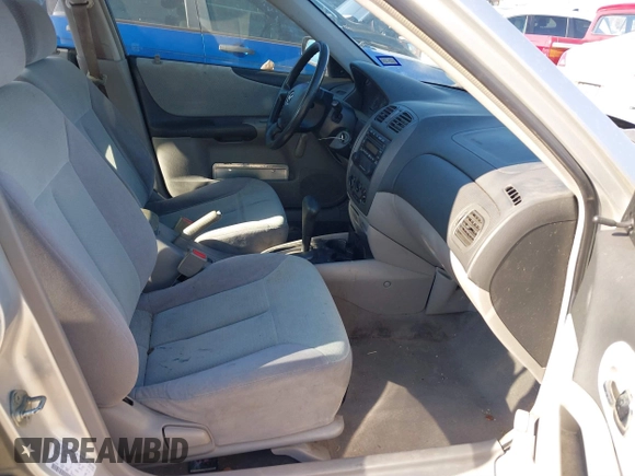 2001 Mazda Protege DX with VIN JM1BJ222810410482, listed as a IAAI auction lot 40799727 with 159,446 mi miles and . Bid and sale history available at DreamBid. Image 5.