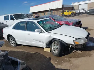 2002 Mazda Millenia S with VIN JM1TA222821725749, listed as a IAAI auction lot 41662948 with 165,088 mi miles and . Bid and sale history available at DreamBid. Image 13.