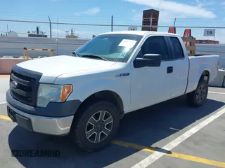 2014 Ford F-150 XL with VIN 1FTEX1CMXEFD13082, listed as a IAAI auction lot 40035539 with 204,751 mi miles and . Bid and sale history available at DreamBid. Image 18.