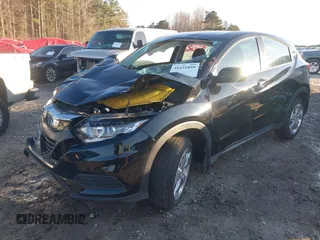2021 Honda HR-V LX with VIN 3CZRU5H32MM730335, listed as a IAAI auction lot 41651859 with 1 mi miles. Bid and sale history available at carsss.com. Image 2.
