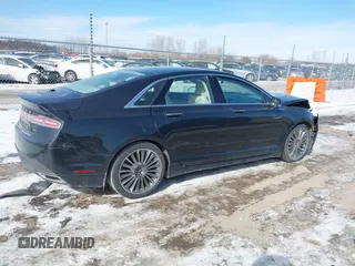 2014 Lincoln MKZ z VIN 3LN6L2GKXER809691, wystawiony jako IAAI lot #41588488 z przebiegiem 163 552 mil mil oraz . Historia ofert i sprzedaży dostępna na DreamBid. Obrazek 4.