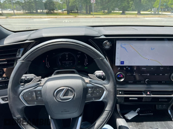 2023 Lexus RX 350h z VIN 2T2BBMCA0PC002695, wystawiony jako Copart lot #62426515 z przebiegiem 112 835 mil mil oraz Czysty tytuł • Clean title. Historia ofert i sprzedaży dostępna na DreamBid. Obrazek 7.