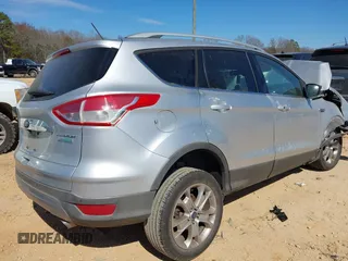 2015 Ford Escape Titanium with VIN 1FMCU0JX2FUB70760, listed as a IAAI auction lot 41649089 with 1 mi miles. Bid and sale history available at carsss.com. Image 4.