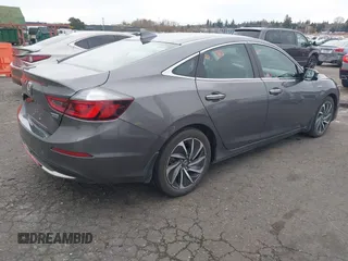 2019 Honda Insight Touring with VIN 19XZE4F90KE020510, listed as a IAAI auction lot 41838187 with 88,649 mi miles and . Bid and sale history available at DreamBid. Image 4.