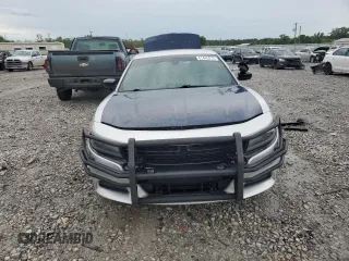 2019 Dodge Charger Police with VIN 2C3CDXATXKH627424, listed as a Copart auction lot 61445815 with 122,296 mi miles and Salvage title. Bid and sale history available at DreamBid. Image 5.