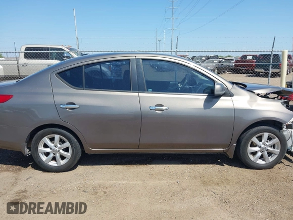2012 Nissan Versa SV with VIN 3N1CN7AP8CL906636, listed as a IAAI auction lot 42007827 with 111,627 mi miles. Bid and sale history available at carsss.com. Image 14.
