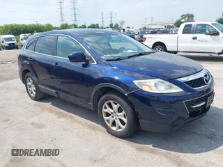 2012 Mazda CX-9 Sport with VIN JM3TB2BAXC0362874, listed as a IAAI auction lot 42673906 with 222,635 mi miles and . Bid and sale history available at DreamBid. Image 1.