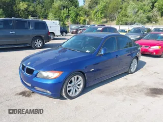 2008 BMW 3 Series 328i with VIN WBAVA37518NL18288, listed as a IAAI auction lot 40032806 with 133,691 mi miles. Bid and sale history available at carsss.com. Image 2.