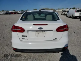 2016 Ford Focus SE с VIN 1FADP3F25GL283615, выставлен на аукционе Copart как лот 52292275 с пробегом 146 155 миль миль и Списание • Salvage title. История ставок и продаж доступна на DreamBid. Изображение 6.
