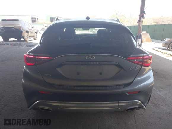 2018 Infiniti QX30 Luxury with VIN SJKCH5CR8JA002357, listed as a IAAI auction lot 42117409 with 103,034 mi miles and . Bid and sale history available at DreamBid. Image 16.
