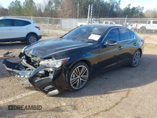 2015 Infiniti Q50 Premium z VIN JN1BV7AR5FM418350, wystawiony jako IAAI lot #41622894 z przebiegiem 135 478 mil mil oraz . Historia ofert i sprzedaży dostępna na DreamBid. Obrazek 18.