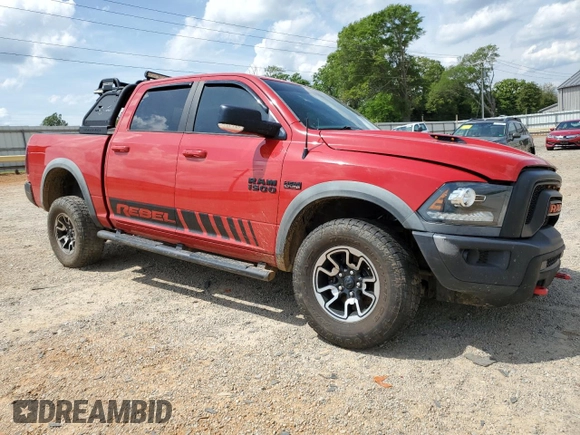 2016 Ram 1500 Rebel z VIN 1C6RR7YT8GS251598, wystawiony jako Copart lot #55291555 z przebiegiem 128 756 mil mil oraz Szkoda całkowita • Salvage title. Historia ofert i sprzedaży dostępna na DreamBid. Obrazek 4.