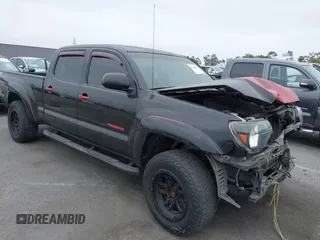 2013 Toyota Tacoma PreRunner z VIN 5TFKU4HN9DX003190, wystawiony jako IAAI lot #42429140 z przebiegiem 299 678 mil mil oraz . Historia ofert i sprzedaży dostępna na DreamBid. Obrazek 1.